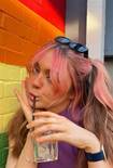 A person drinking from a straw  Description automatically generated with medium confidence